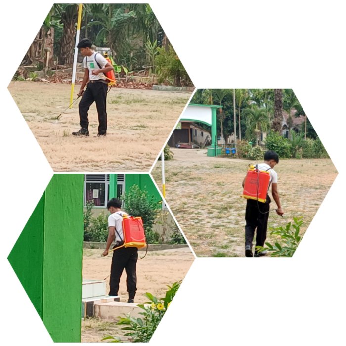 Penyemprotan Halaman MIN 2 Muaro Jambi Antisipasi Kabut Asap Penyemprotan Halaman MIN 2 Muaro Jambi Antisipasi Kabut Asap
