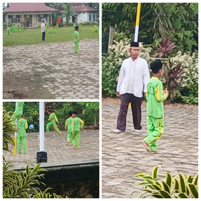 Guru PJOK Dampingi Siswa Kelas 4 Bermain Sepak Bola di Halaman Madrasah