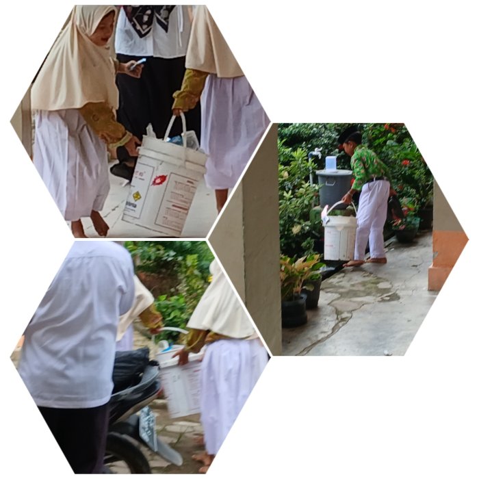 Zamroni staf  MIN 2 Muaro Jambi Dampingi Siswa Cipta Lingkungan Bersih  Dan Nyaman