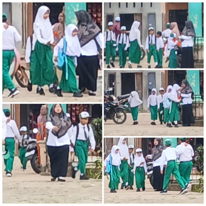 Guru Piket MIN 2 Muaro Jambi Sambut Siswa di Gerbang Madrasah