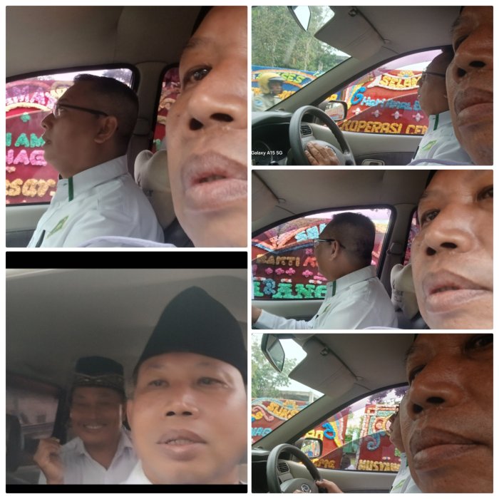 Staf MIN 2 Muaro Jambi Melintasi Papan Ucapan HAB ke-80