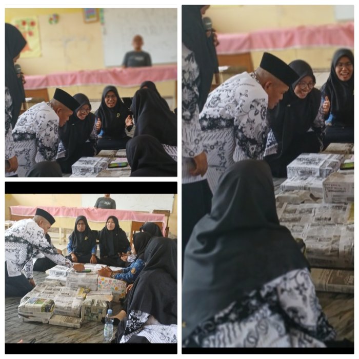 Penekanan Tombol oleh Kamad Meriahkan Hari Guru ke-80 di MIN 2 Muaro Jambi 