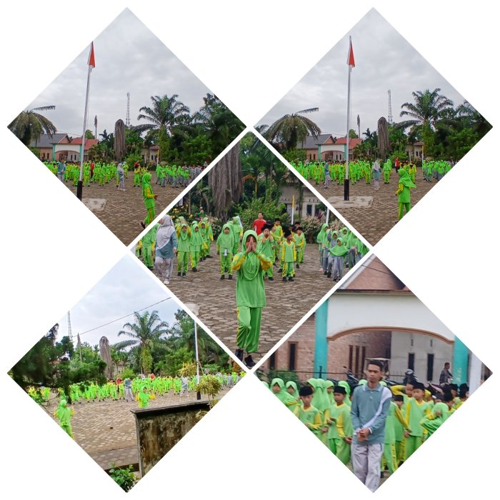 Mustar waka kesiswaan Dampingi Peserta senam di halaman Min 2 Muaro Jambi