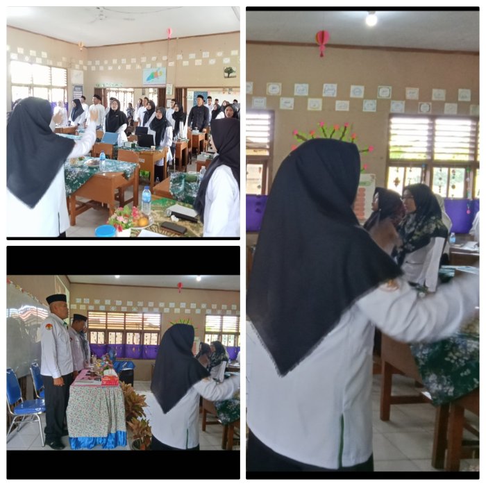 Muspidah Pimpin Lagu Indonesia dan Mars Madrasah Pada acara KKG Madrasah  di MIN 2 Muaro Jambi