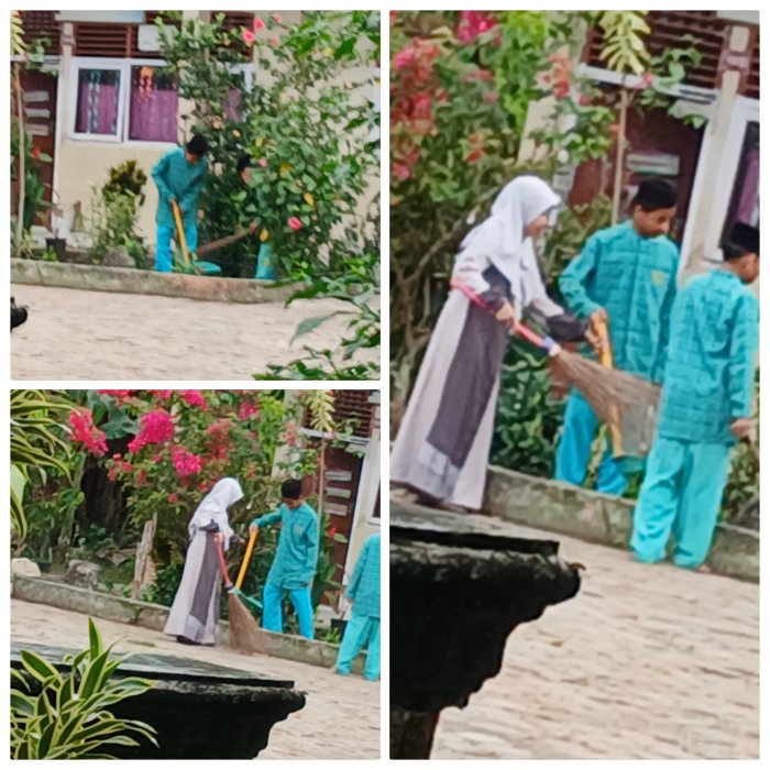 Guru MIN 2 Muaro Jambi Dampingi Siswa Gotong Royong Guru MIN 2 Muaro Jambi Dampingi Siswa Gotong Royong