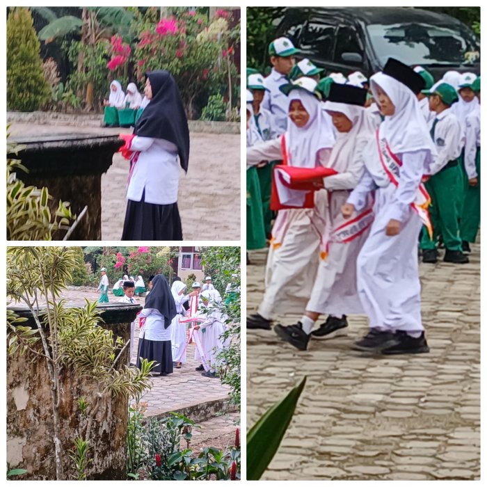 Guru Piket Serahkan Bendera untuk Upacara di MIN 2 Muaro Jambi Guru Piket Serahkan Bendera untuk Upacara di MIN 2 Muaro Jambi