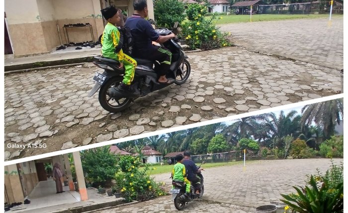 Zamroni Staf MIN 2 Muaro Jambi Dampingi Azka  Siswa 3A Yang Sakit