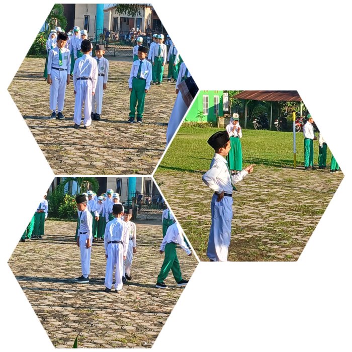 Ummam Zadda Pimpin Upacara Bendera di Madrasah Ibtidaiyah Negeri 2 Muaro Jambi.
