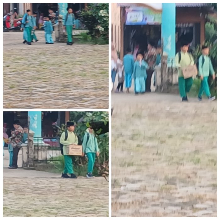 Guru Pikket Min 2 Muaro Jambi Sambut Siswa DiGerbang Madrasah
