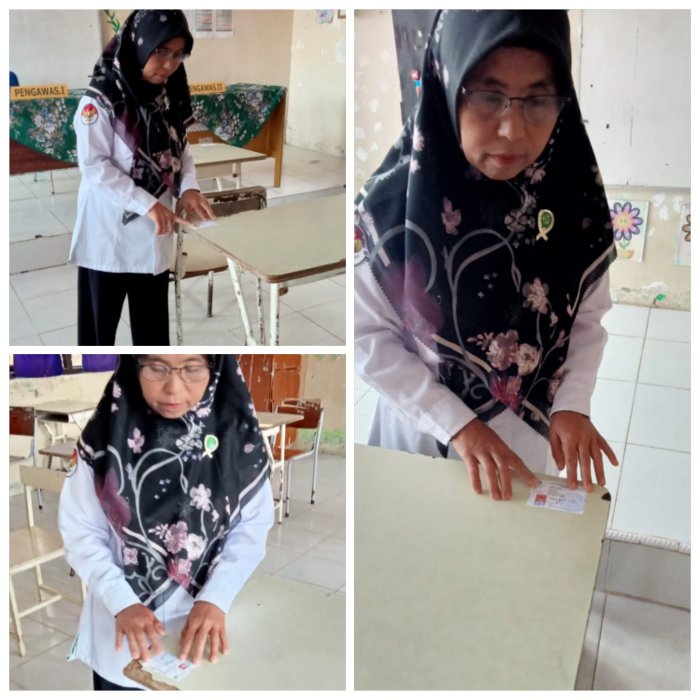 Staf MIN 2 Muaro Jambi Tempel Nomor Peserta Ujian Madrasah Staf MIN 2 Muaro Jambi Tempel Nomor Peserta Ujian Madrasah