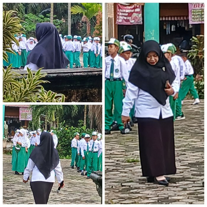Guru Piket Siapkan Barisan Siswa Jelang Upacara di MIN 2 Muaro Jambi