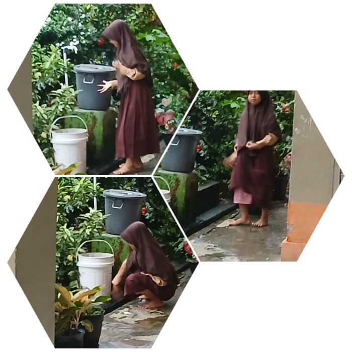 Siswa MIN 2 Muaro Jambi Bersihkan Selokan Saat Hujan