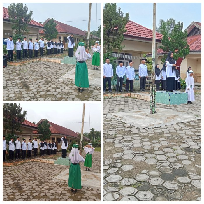 Guru Fikih Fitria Pimpin Upacara Bendera di Madrasah Tarikan Guru Fikih Fitria Pimpin Upacara Bendera di Madrasah Tarikan