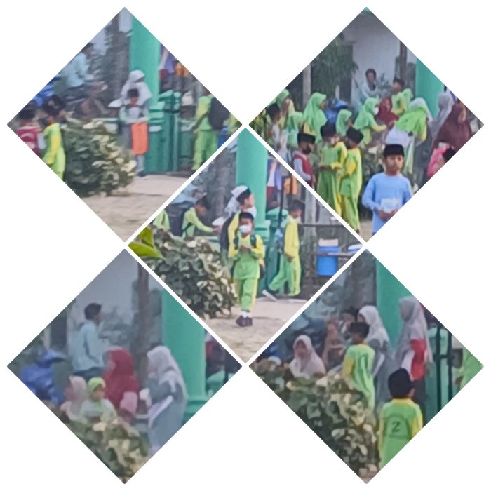 Dua Guru MIN 2 Muaro Jambi Sambut Siswa di Gerbang Madrasah Dua Guru MIN 2 Muaro Jambi Sambut Siswa di Gerbang Madrasah