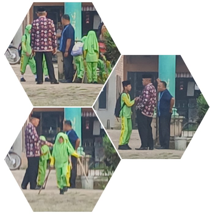 Staf dan Kepala MIN 2 Muaro Jambi Sambut Siswa di Gerbang Staf dan Kepala MIN 2 Muaro Jambi Sambut Siswa di Gerbang