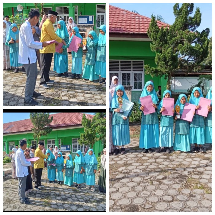 Kamad MIN 2 Muaro Jambi Serahkan Trofi Dan Piagam Juara Lomba Aksioma 2026