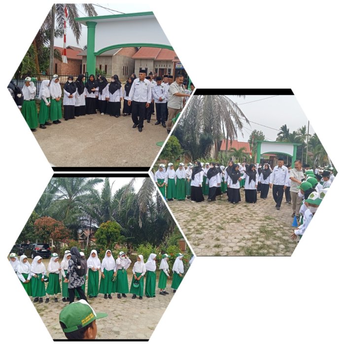 Penyambutan Tim Asesor Lakukan Visitasi ke MIN 2 Muaro Jambi Saat Kabut Asap