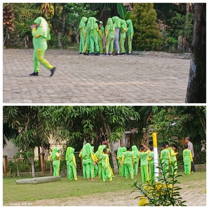 Punis Arifin Pimpin Pemanasan Siswa MIN 2 Muaro Jambi Punis Arifin Pimpin Pemanasan Siswa MIN 2 Muaro Jambi